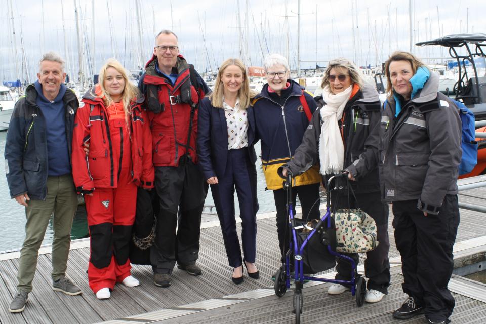 Group of people at harbour in Dublin