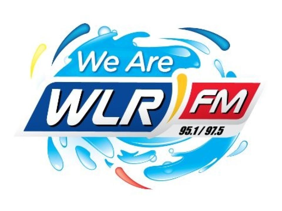 We Are WLR FM logo, featuring blue and red text with the radio frequencies 95.1 / 97.5, surrounded by water splash graphics