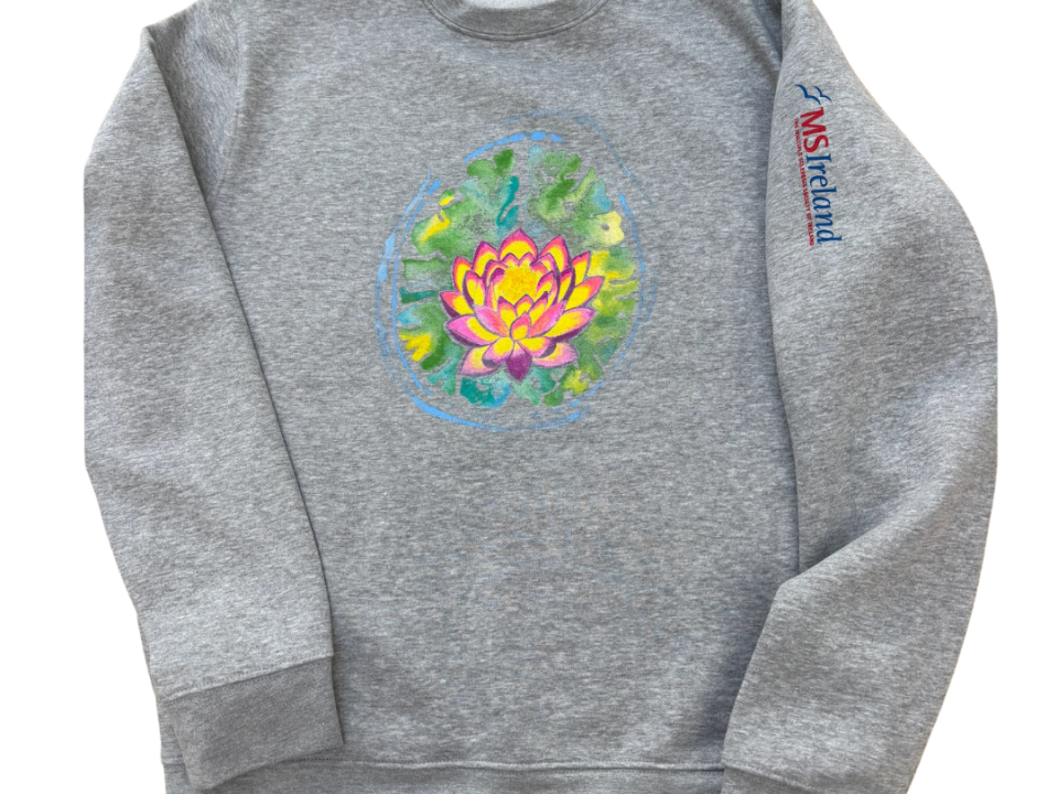 Logo design by Ruth Burden titled 'Lotus Brain Scan'—a symbolic lotus flower over a brain scan image, representing hope and resilience in the MS community.