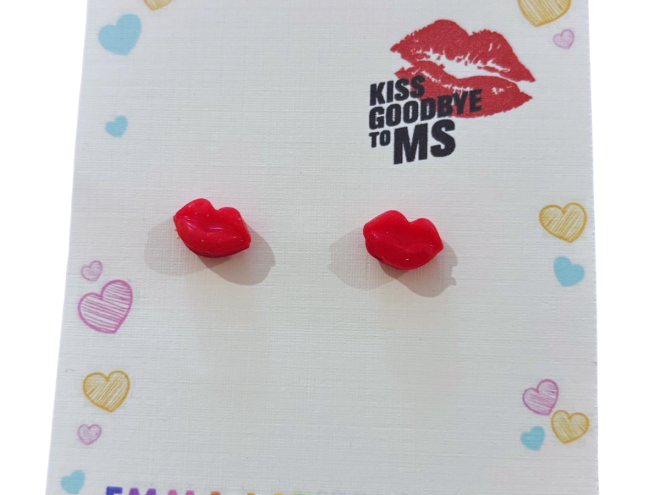 Handmade red lip stud earrings by Emma Larkin Design on display card